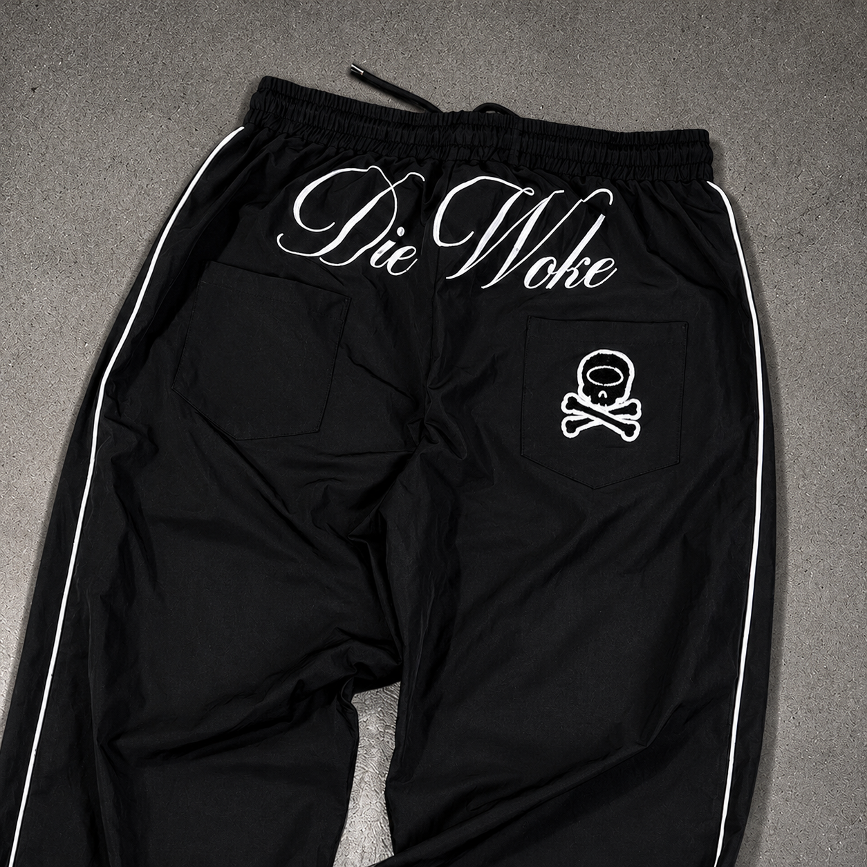 "DIE WOKE" TRACKPANTS(ONLY 100 MADE)